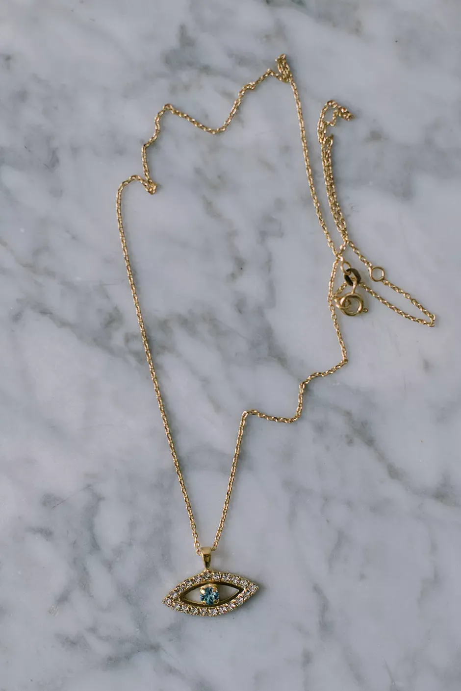 Greek Eye Necklace Gold Crystal/Aquamarine^CAROLINE SVEDBOM New
